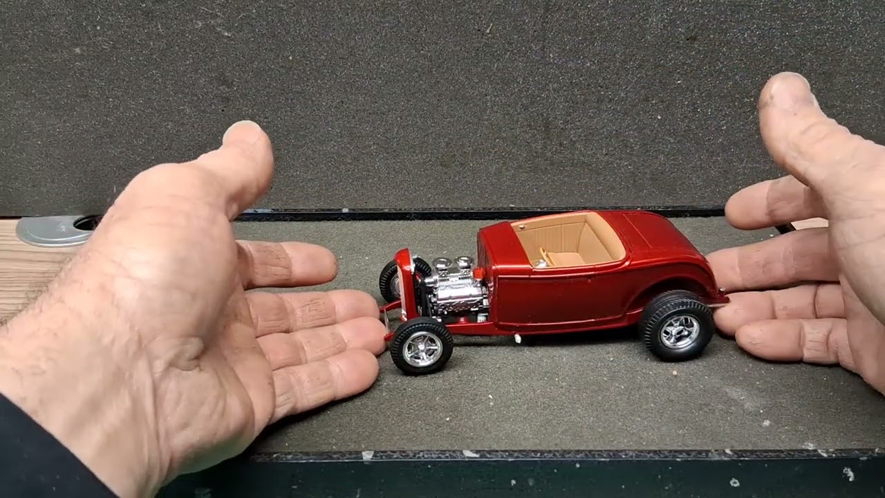 Carla and Woodys bench update caddy and 32 ford roadster. 