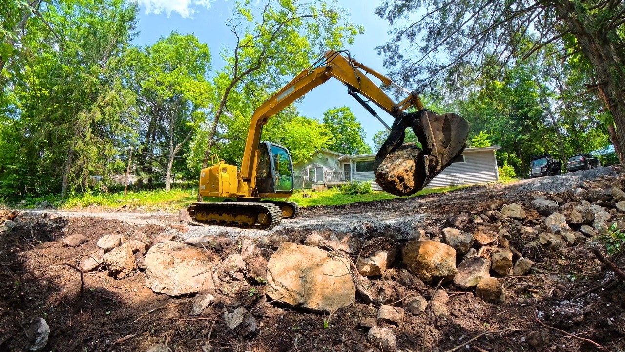 Expanding A Driveway Using Natural Boulders From The Site