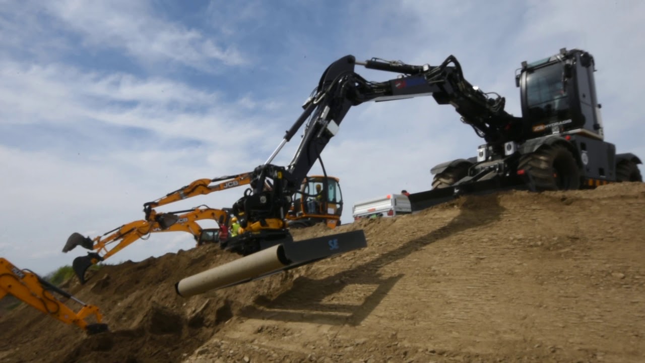 Srovnávací rám SE S45 na rypadle JCB Hydradig 110W s tiltrotátorem Engcon EC209