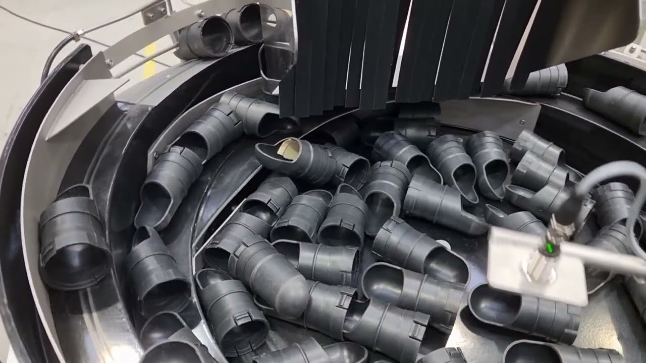 Bowl Feeder feeds and orientates Bag Connectors - RNA Automation Ltd