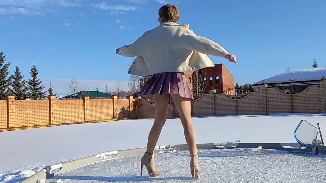 IN THIN NYLONS and HIGH HEELS I dance on SNOW and ICE...