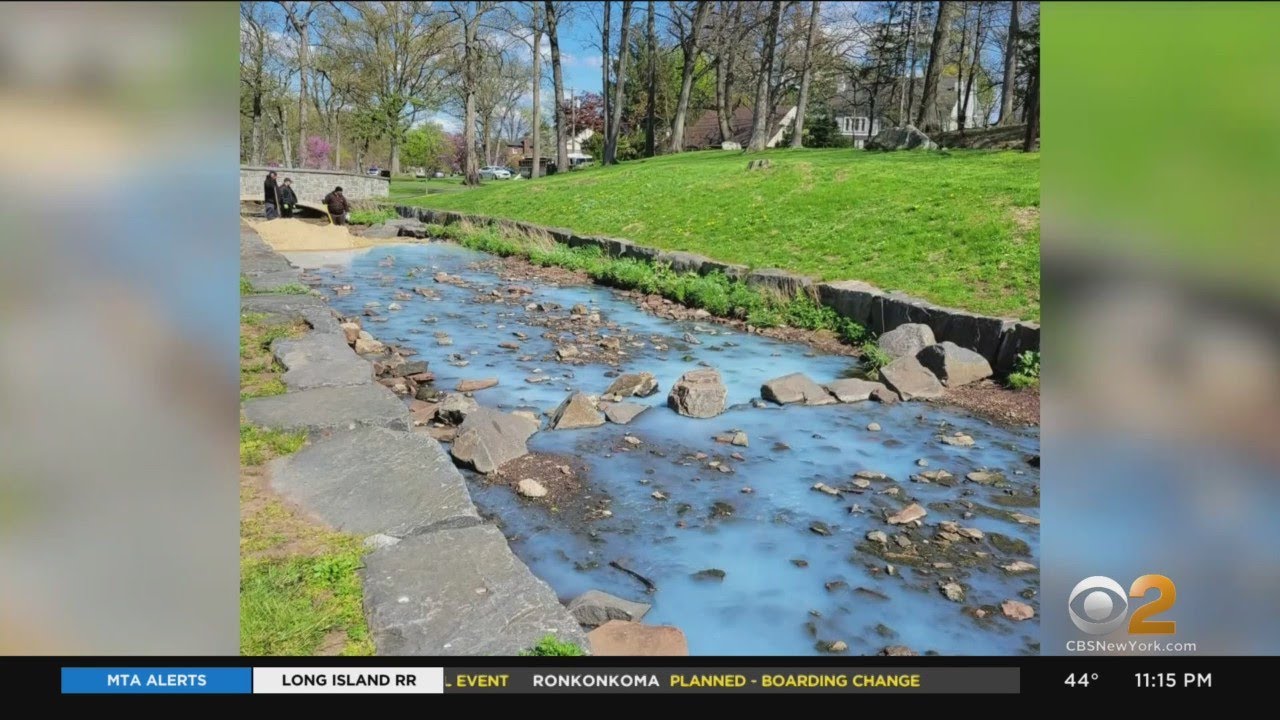 Passaic, N.J. officials trying to determine why a popular lake has turned milky blue