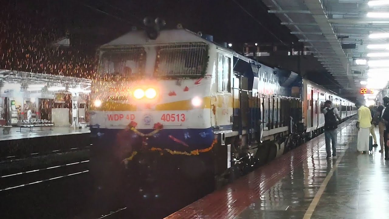 POORNA EXPRESS ON ITS FIRST LHB RUN ARRIVES AT THALASSERY WITH DECORATED DIESEL WDP4D