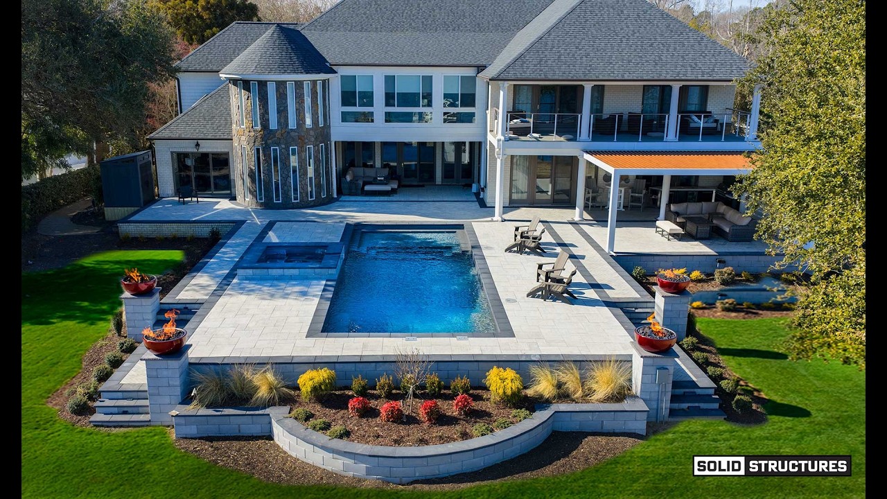Complete Backyard Transformation and Swimming Pool Install by Solid Structures.