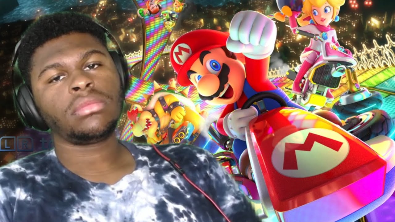 Mario Kart 8 Deluxe… Why is she still playing? Get off... NOW!