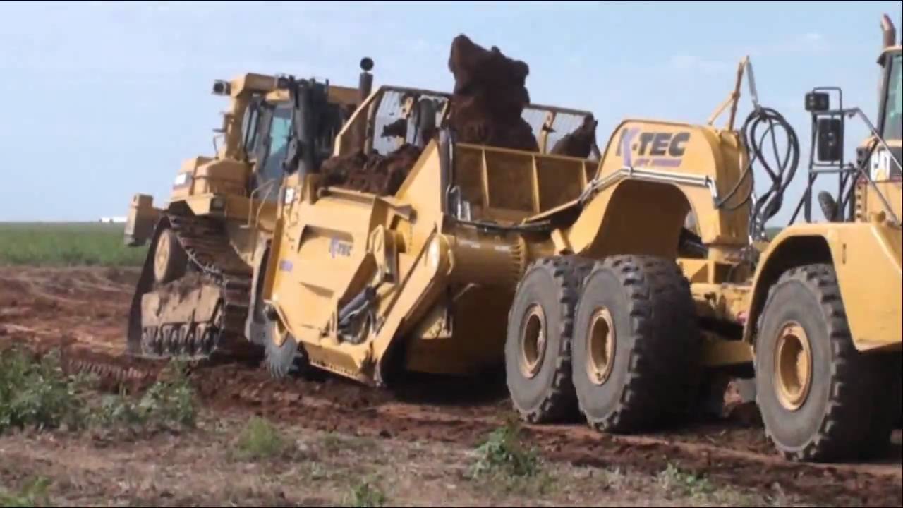 K Tec 1254 ADT Loading with D10 push Cat