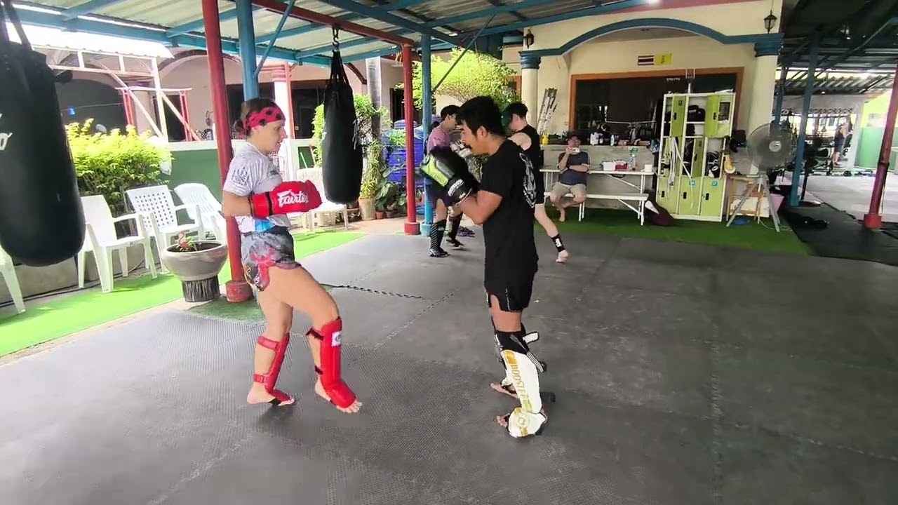 Paulina sparring with Kru Chalarmphet at Sitjaopho Muay Thai Hua Hin Thailand 