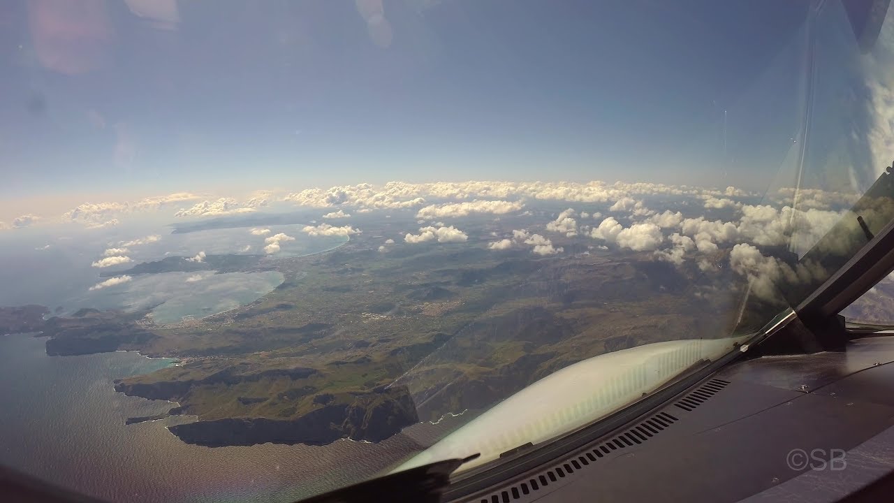 Cockpit view of Mallorca Island: Approach + landing at  Palma de Mallorca airport on runway 24L. 4k