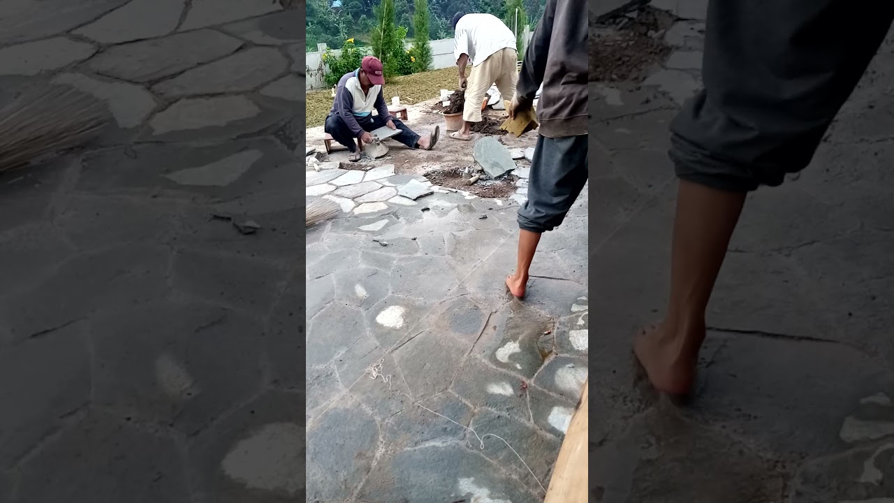 proses pemasangan lantai batu alam