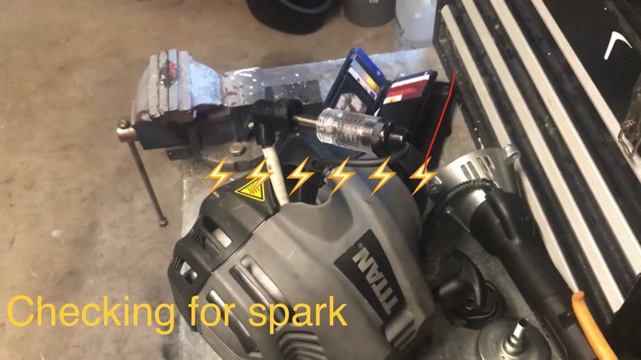 Titan 25cc petrol strimmer Checking for spark.