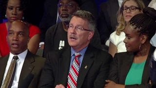 Debate over healing the racial divide in America