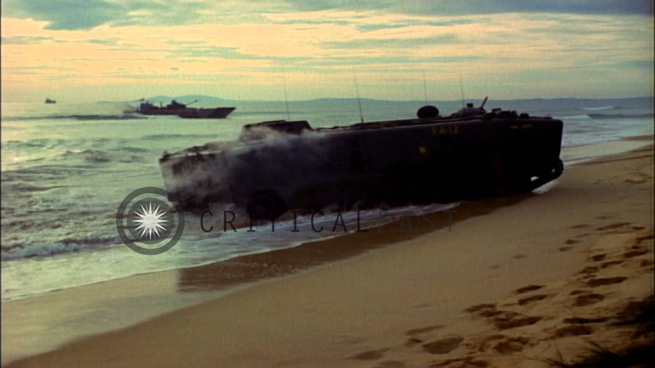 LVTP5s move onto beach and M-48 tank comes off LCVP in deep water in Chu Lai in Q...HD Stock Footage