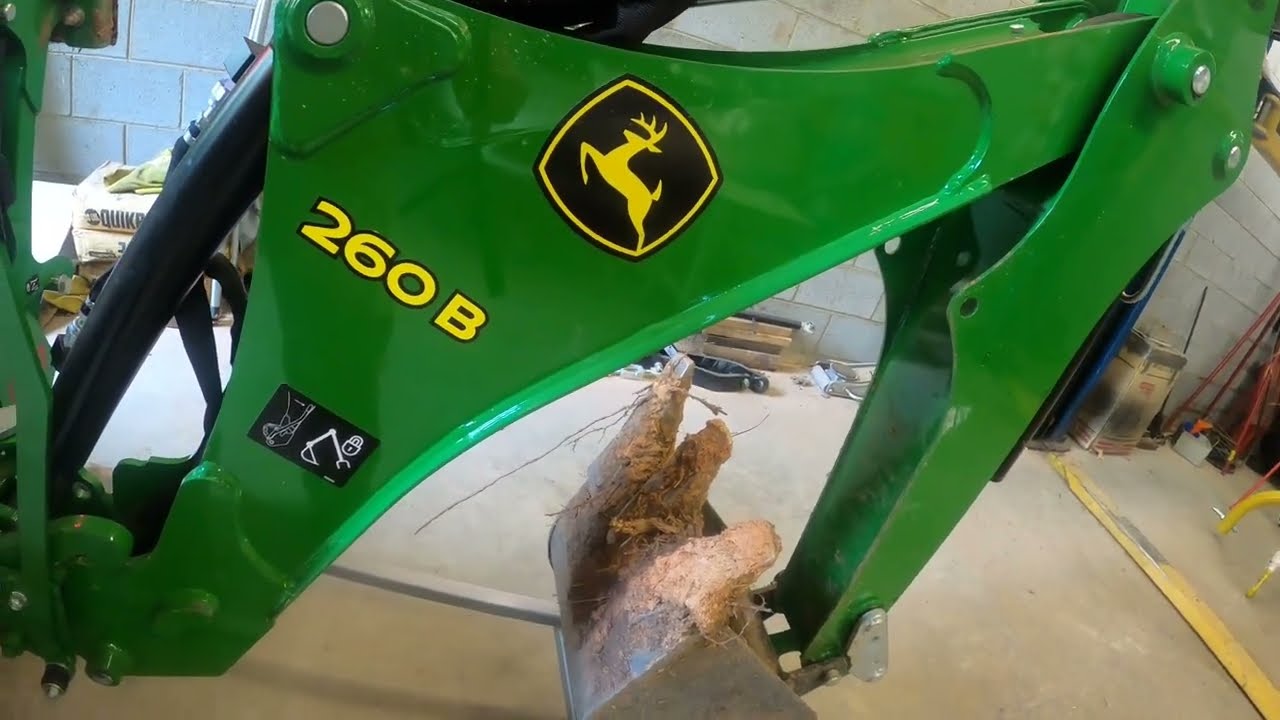 Yes I did it! Broke it! John Deere 2025R Backhoe removal to the Bxpanded Dolly!  Lesson Learned!