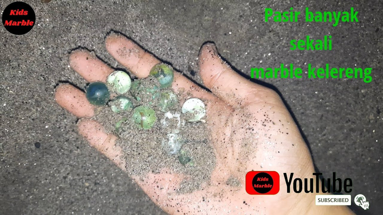 mencari kelereng di tanah pasir ( marble )