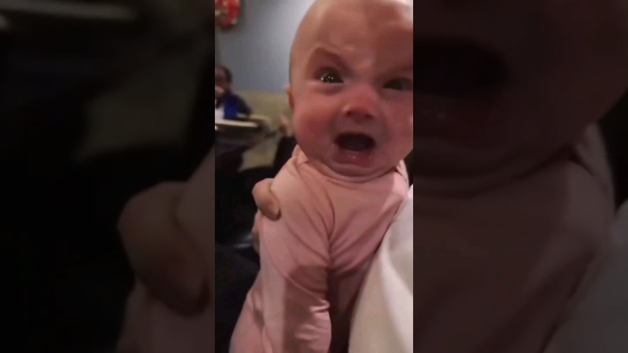 Little baby is scared of fire