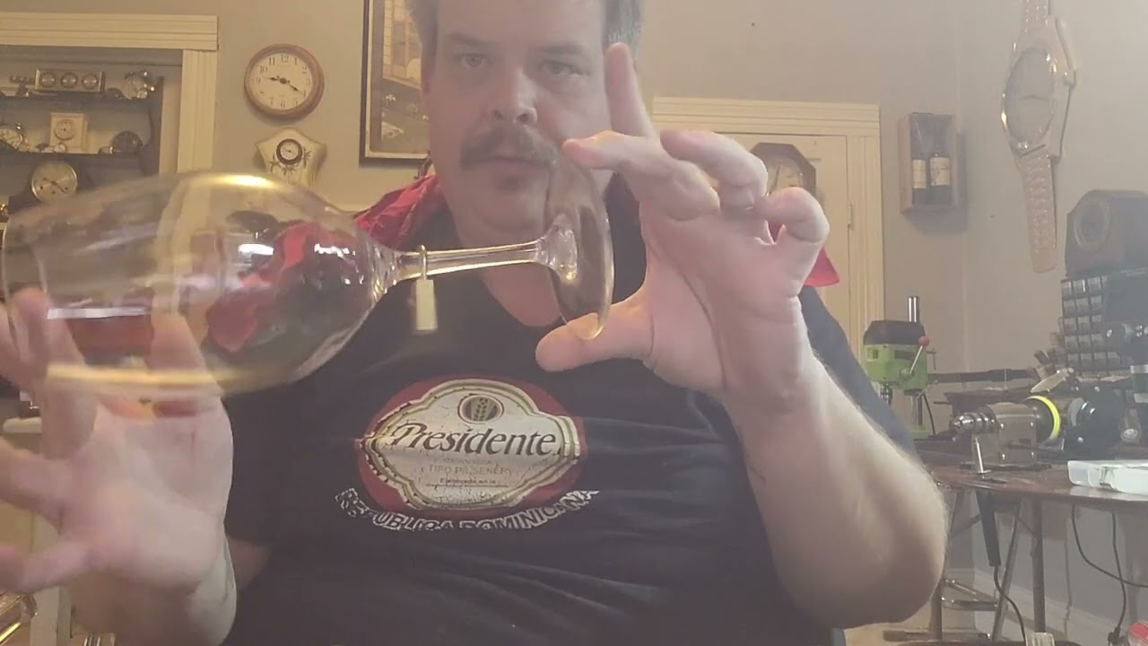the Ghost lock & Glass magic trick. performed by Chris Campbell Master Magician .
