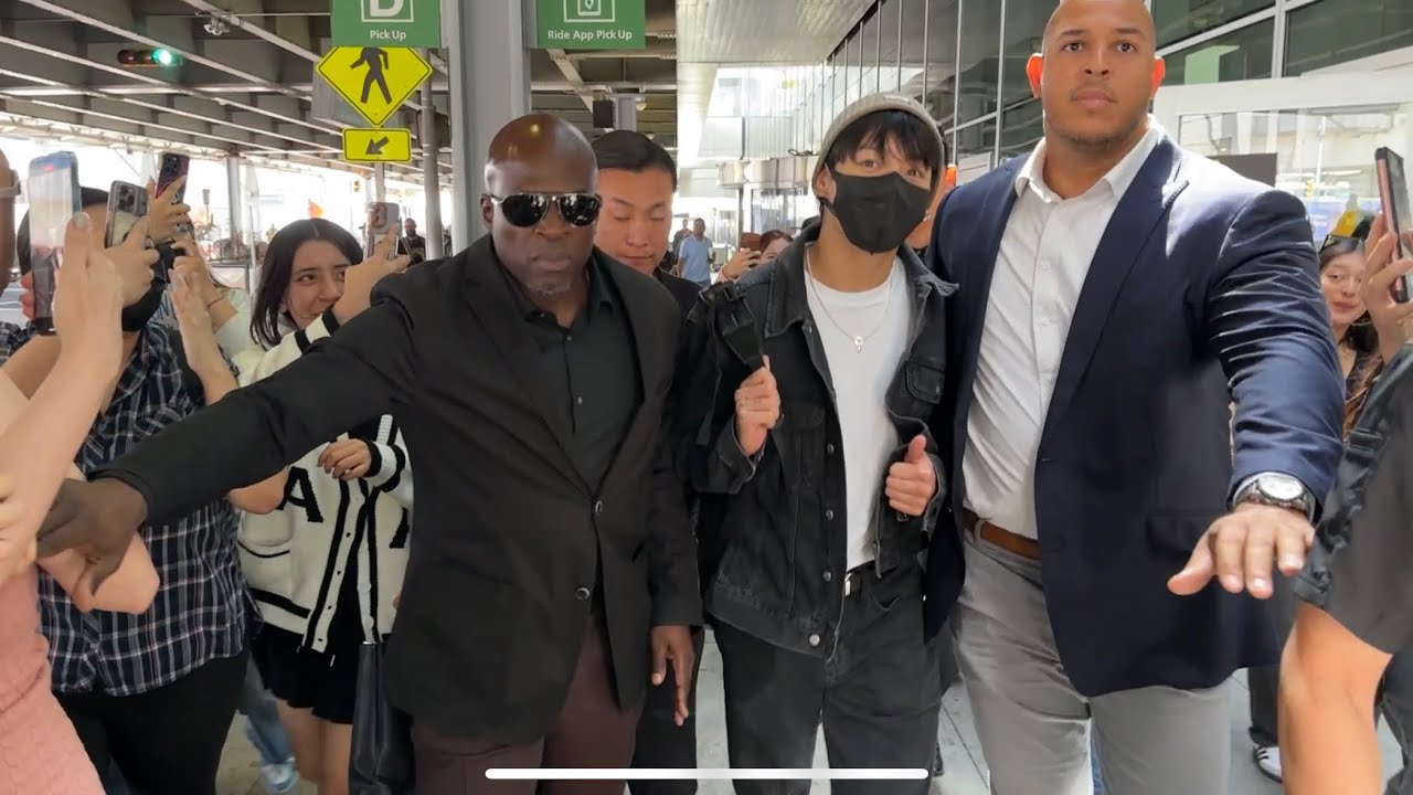 Jung Kook met by lots fans & trips at JFK creating a chaotic scene! #jungkook #jk #jeonjungkook