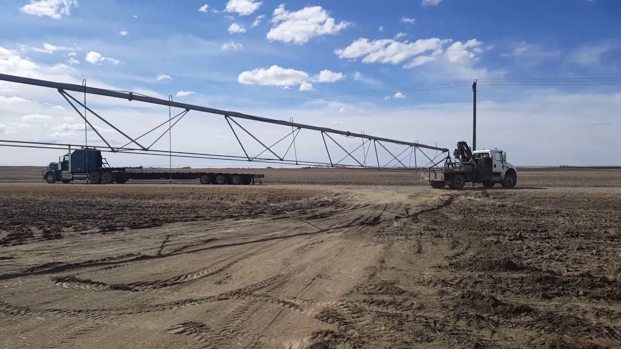 Moving pivot tower