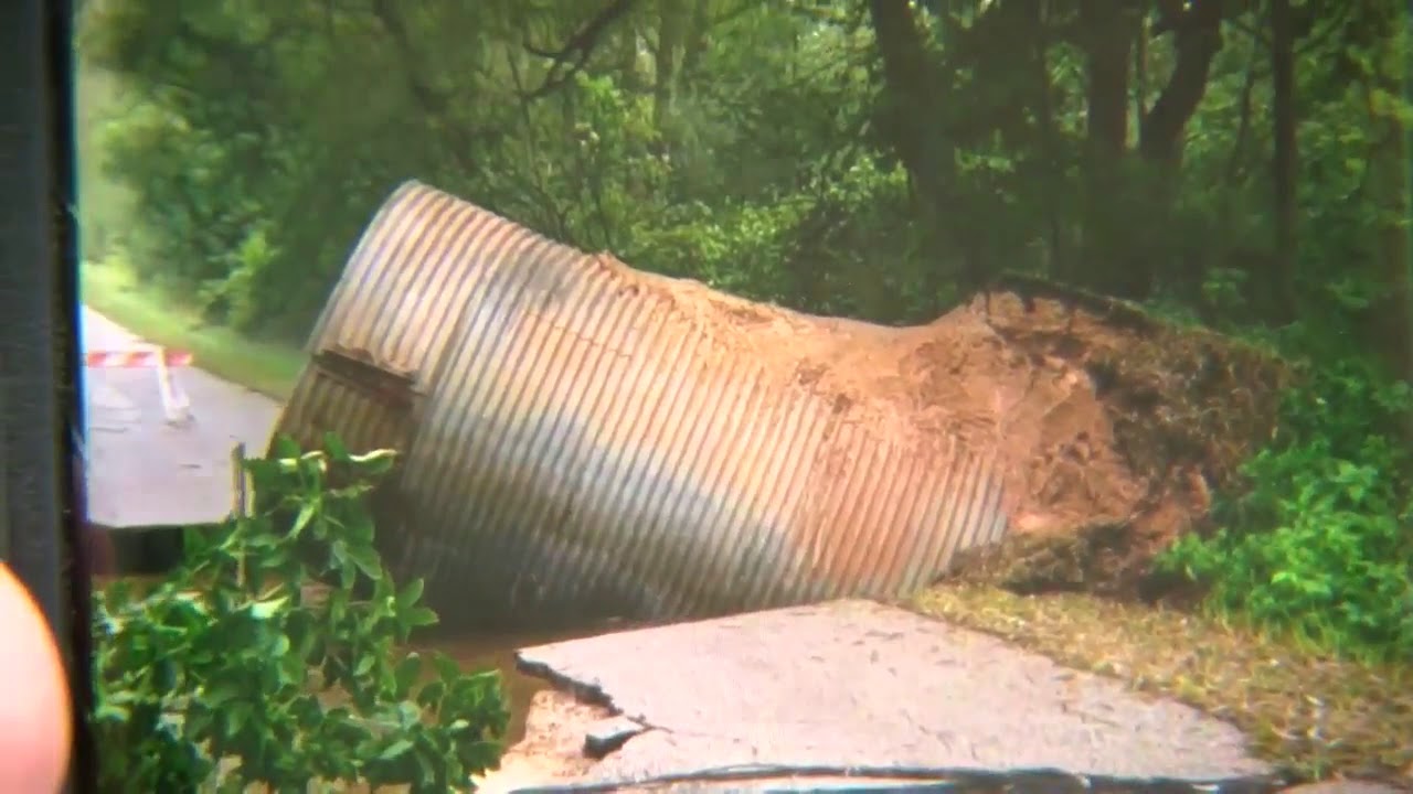 Road washed away by floods in Washington County