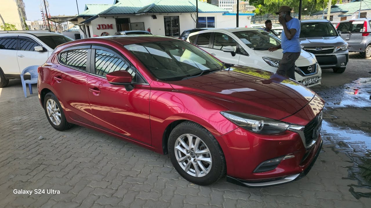 THIS CAR WILL TAKE OUT YOUR FAVOURITE TOYOTA FIELDER. 2018 MAZDA AXELA IS A GEM 0711431667