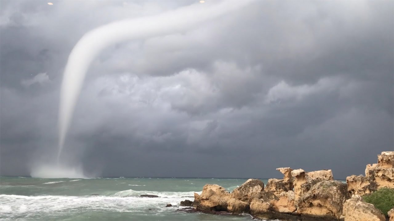 Diner Captures Massive Waterspout Flying Across Sea