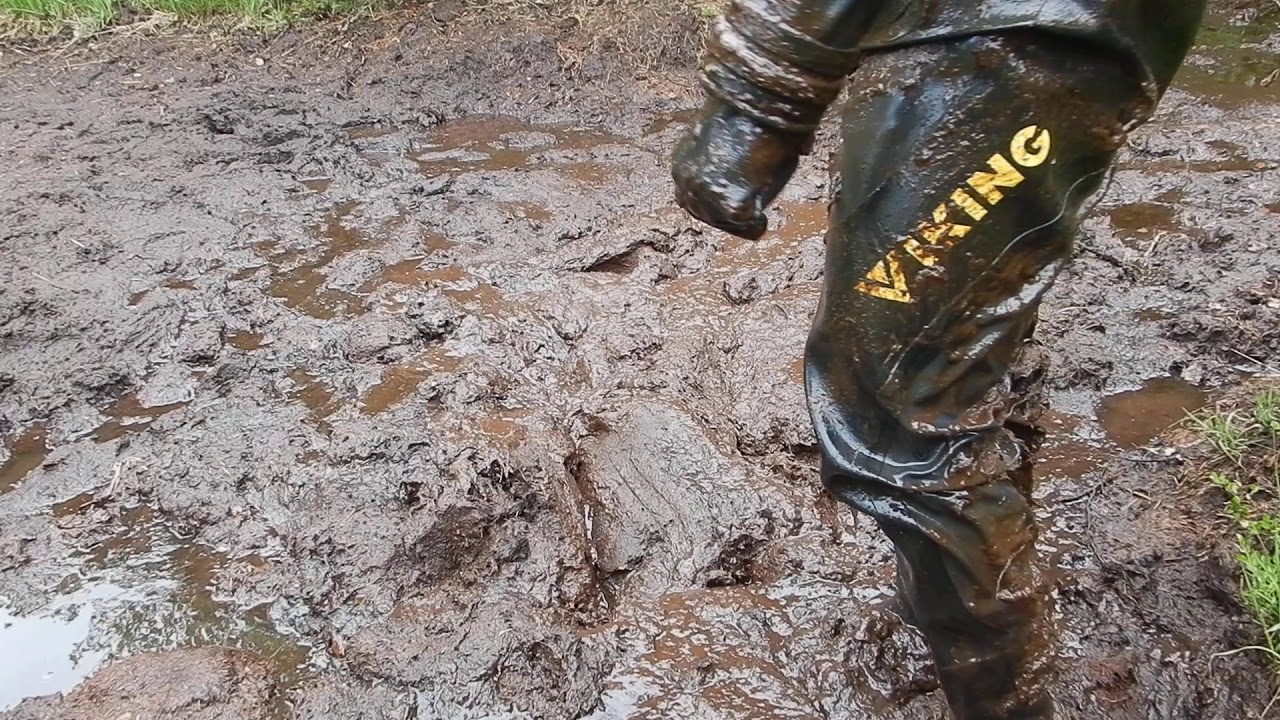 Getting out of that mud, completely covered and buried in quicksand in Viking drysuit