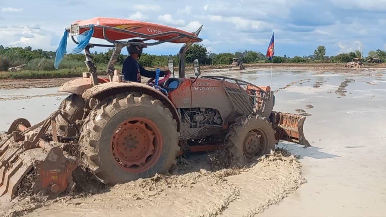 Kubota Machine Tractor Harrowing Rice Field, Tractor Cambodia Operating Stuck In Mud,Tractor Plowing