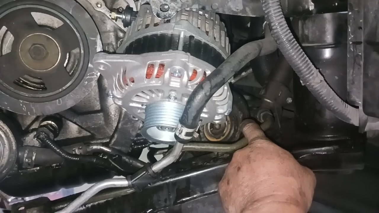 cambio de alternador Nissan pathfinder V6 3.5 2014