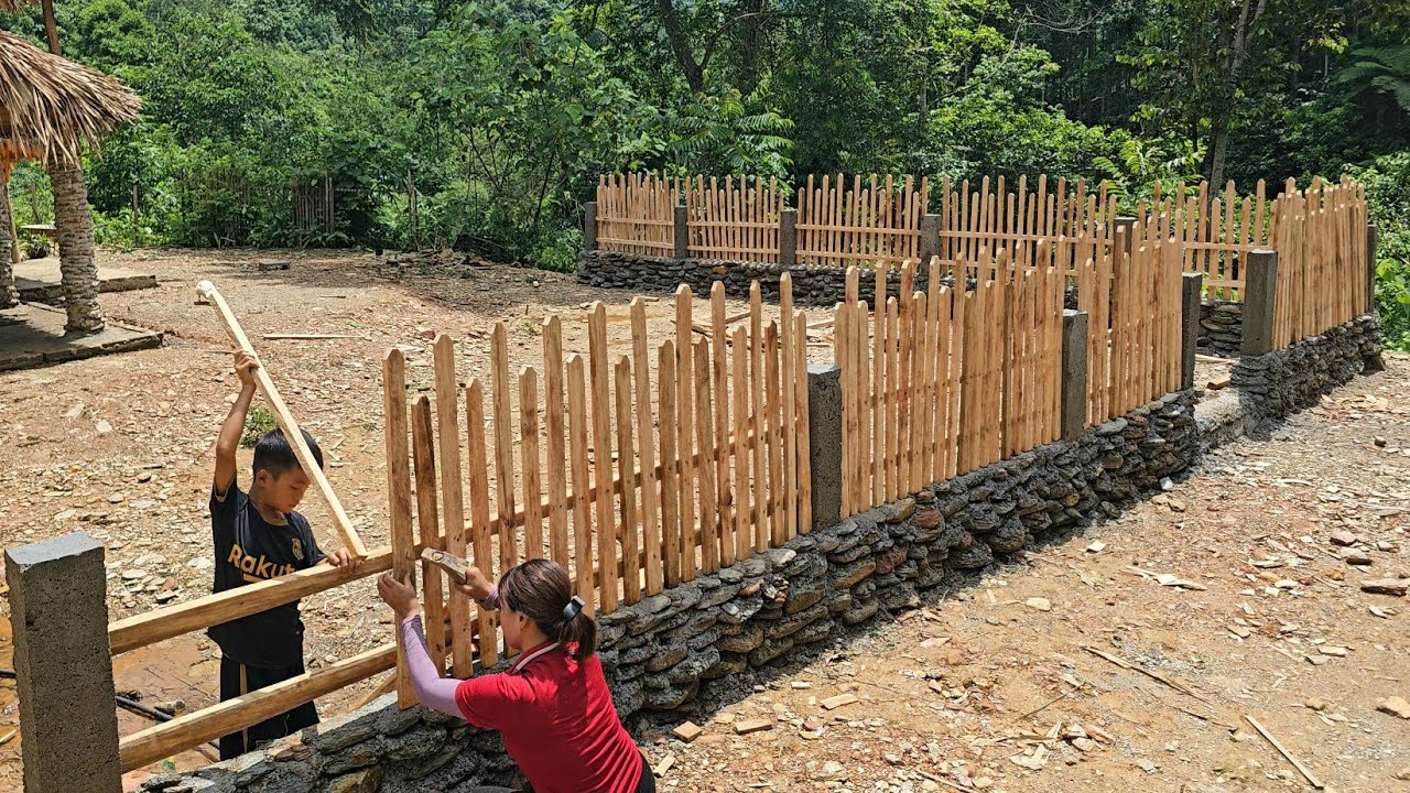 The process of mother and son building a wood stove and fence, made of cement | farm building