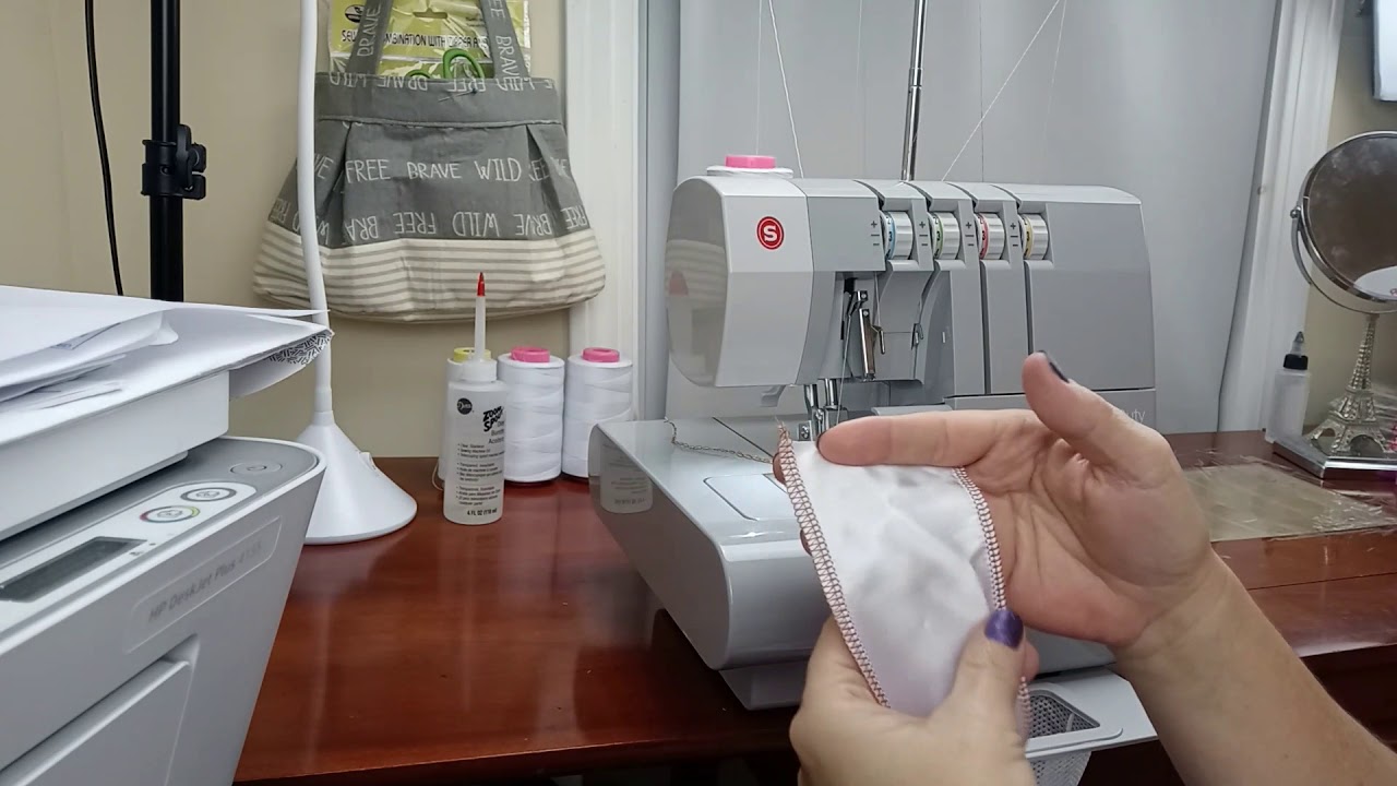 Cómo ajustar el ancho de costura de la Singer overlock 14HD854