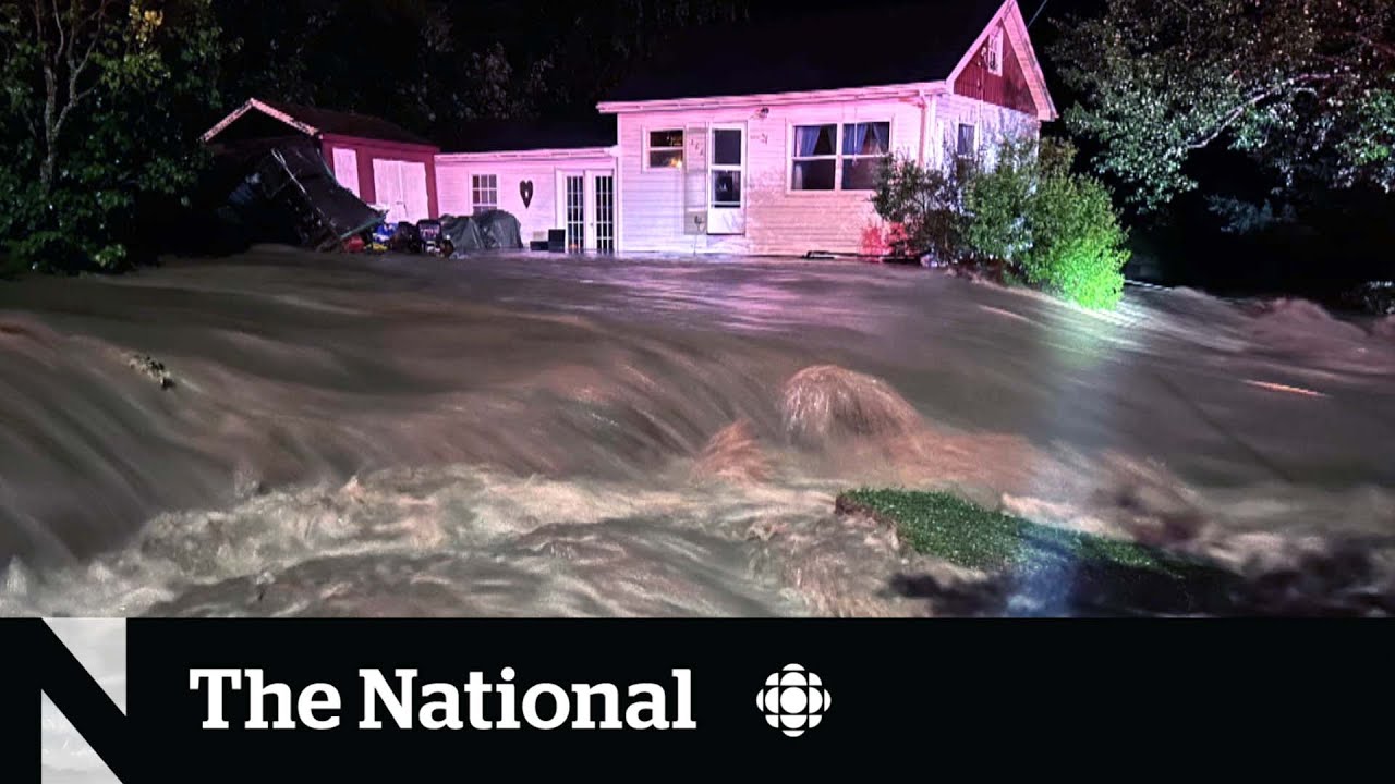 Dramatic rescue of a woman from Nova Scotia floods by a volunteer firefighter