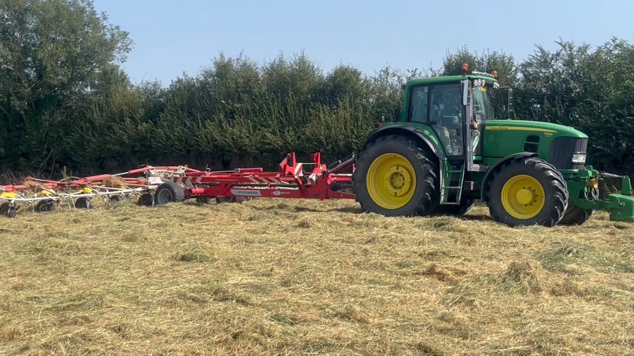 John Deere 7630 with a Pottinger Tedder 