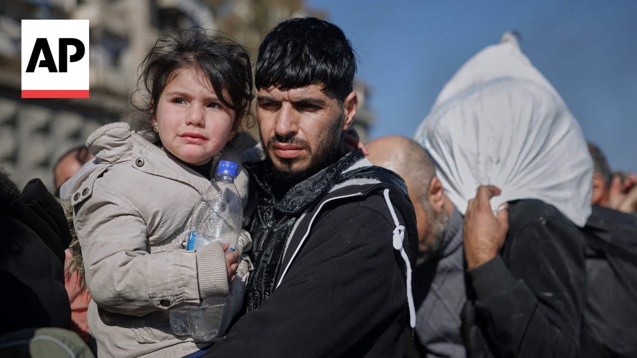 Hundreds in Syria flee Aleppo neighborhood as forces move into the area