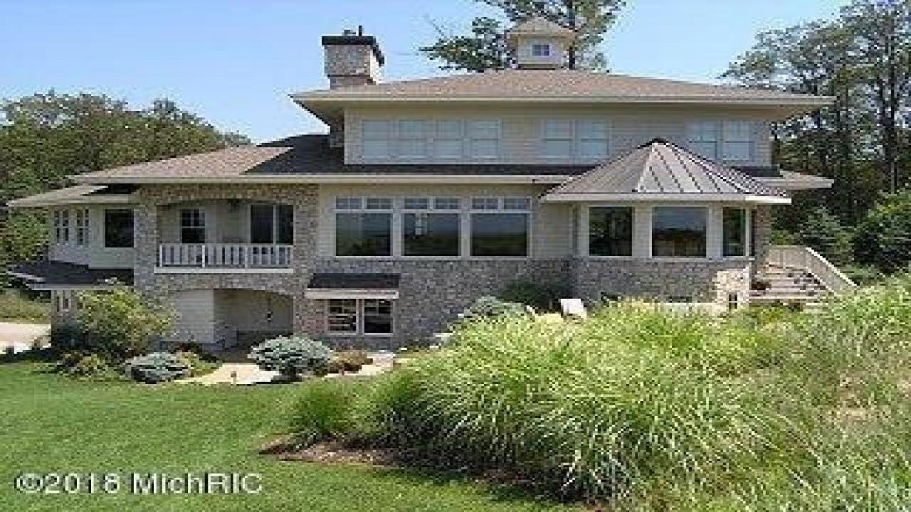 17294 Wood Drift Drive, West Olive, MI Presented by Andrea Crossman.