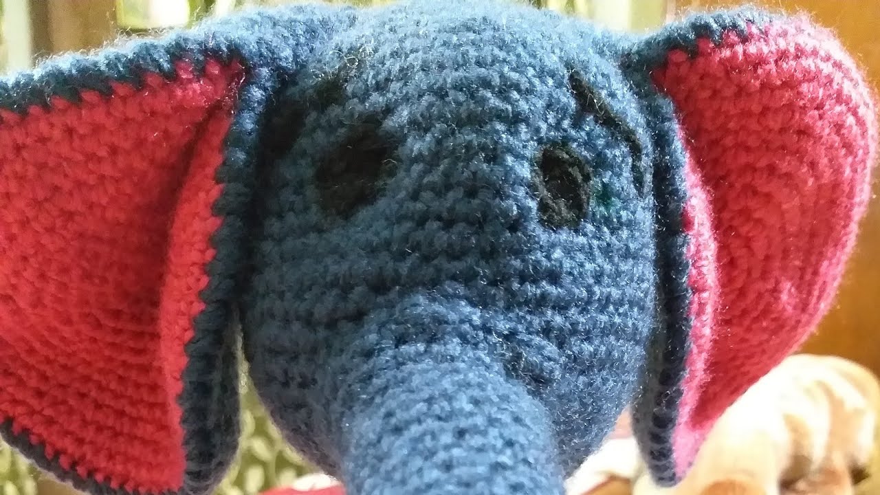Handknitted baby elephant toy