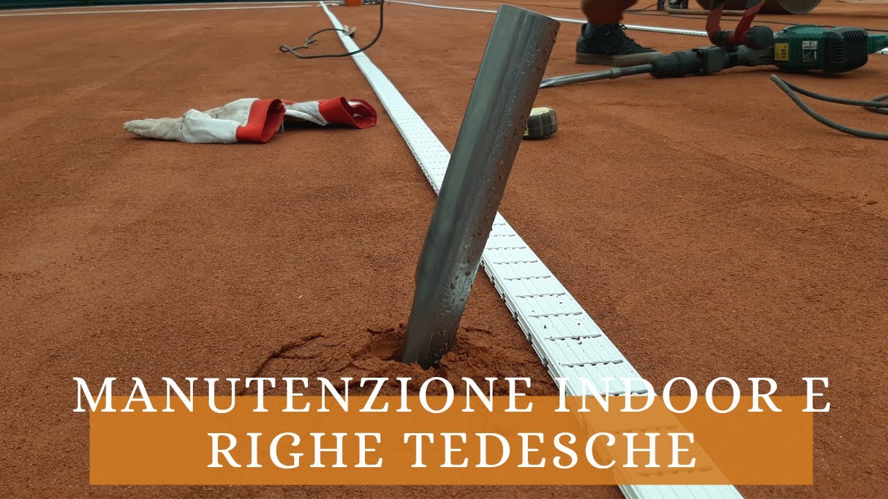 Clay court heavy maintenance and new german lines.  Manutenzione indoor e nuove righe tedesche