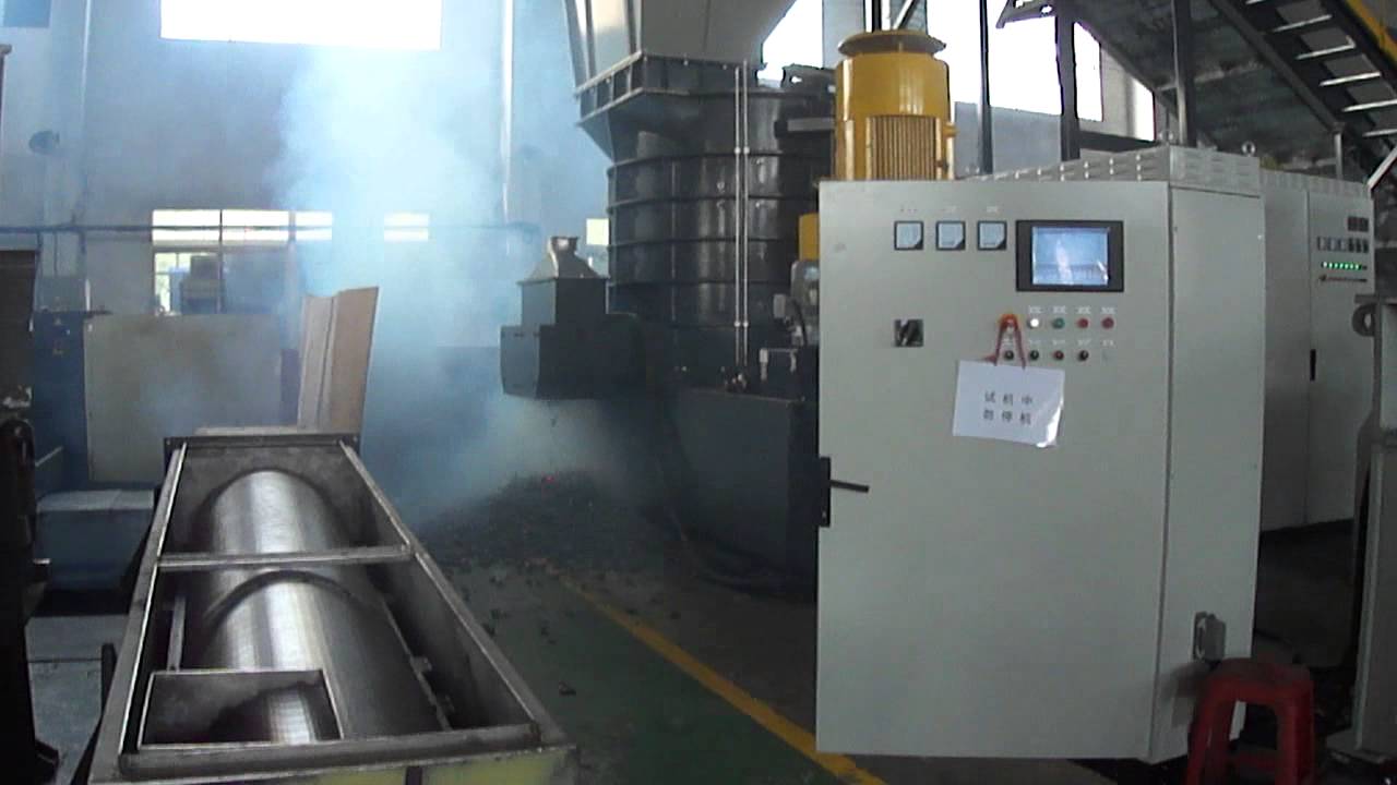EIDAL VERTICAL DRAVO SHREDDER WITH METAL FRAG BEING EJECTED FROM DISCHARGE