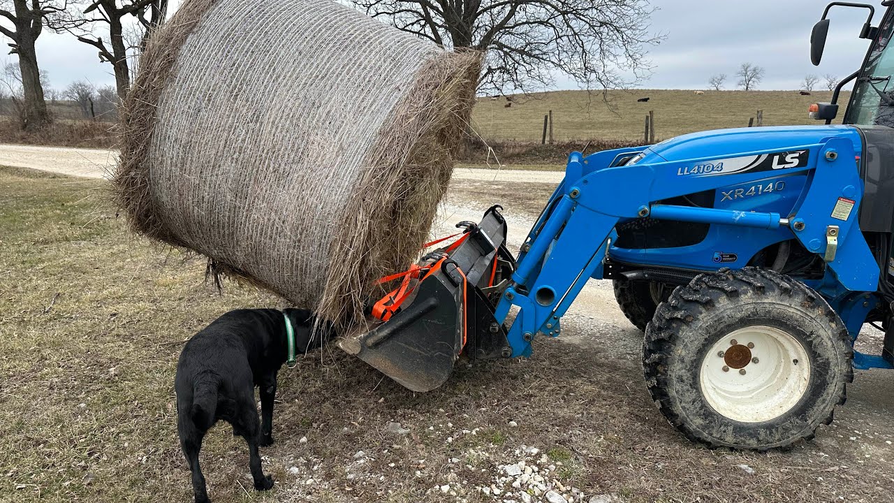 Will vevor clamp on forks move a round bale with the LS 4140