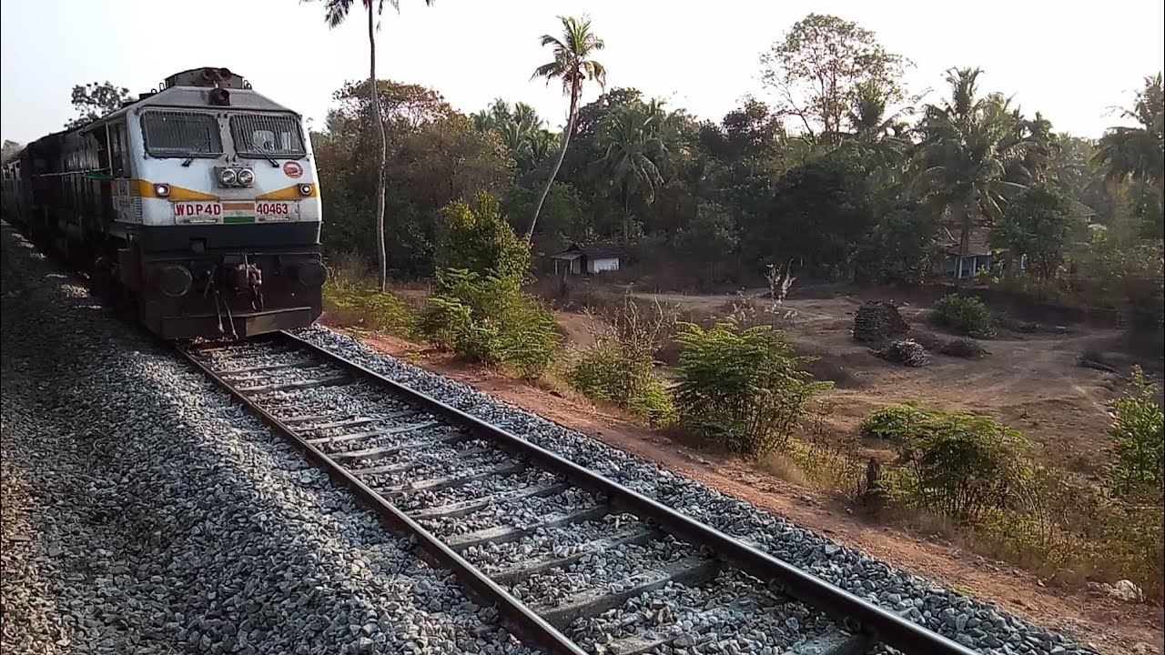 Matsyagandha Express (12620) crossing Mangaluru-Madgaon Passenger at Shiroor with a slow pace