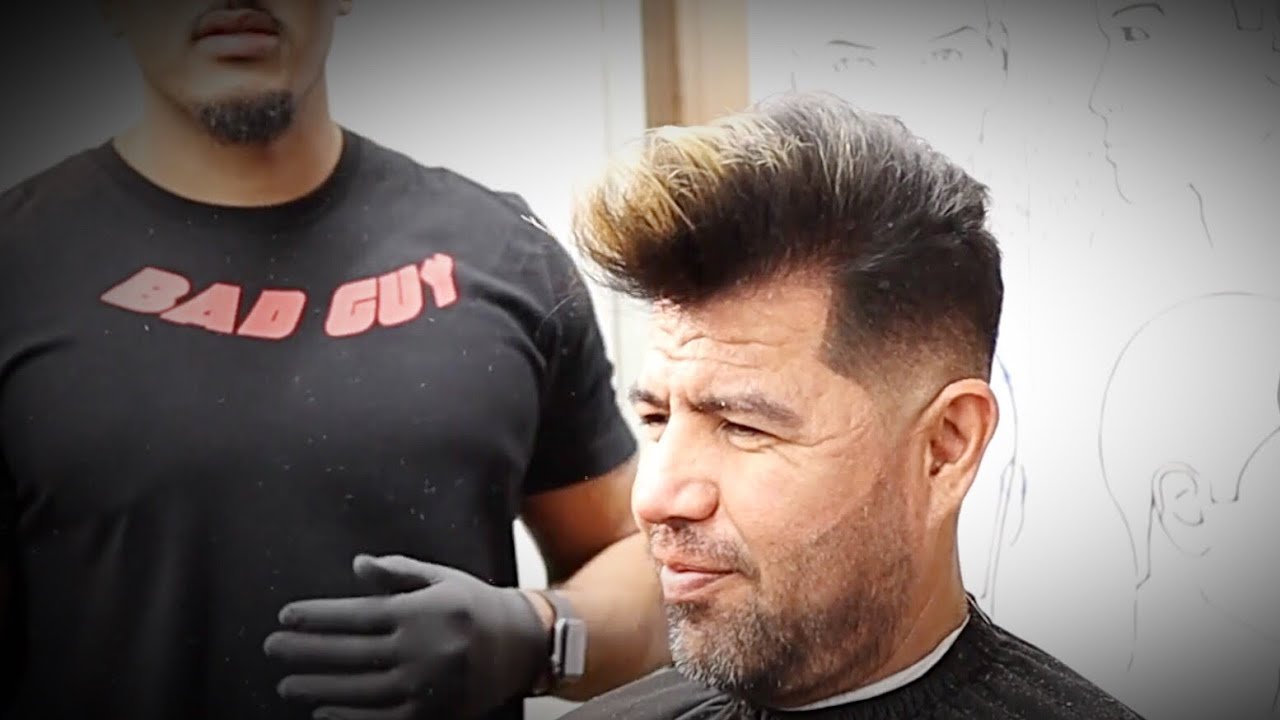 Modern pompadour fade and style using volumizing powder