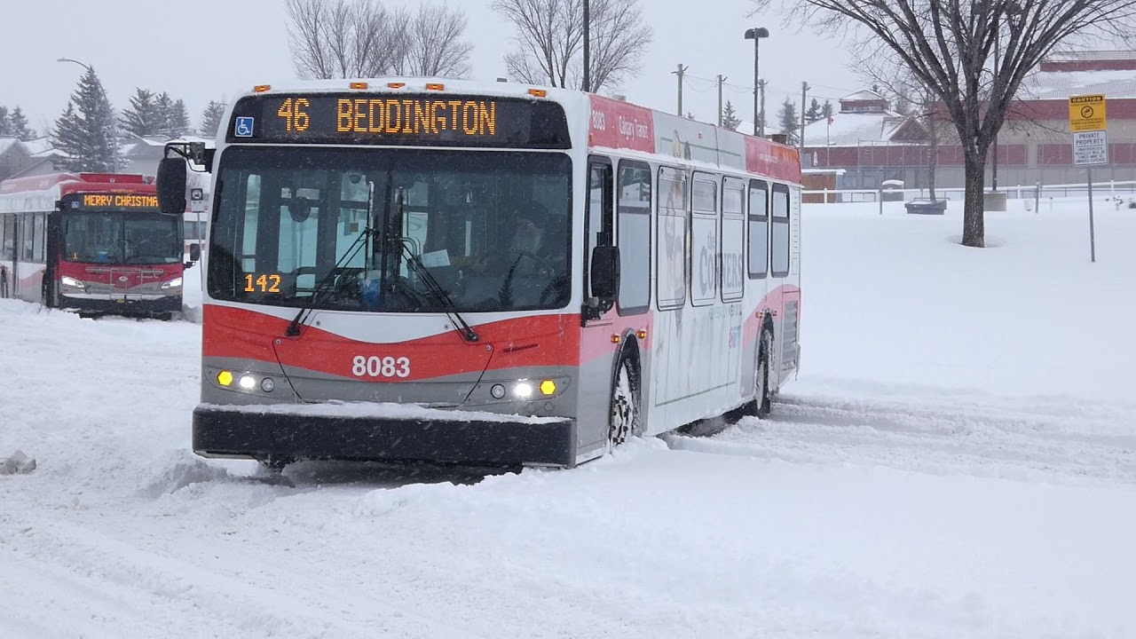 Calgary Transit bus spinning tires in the snow