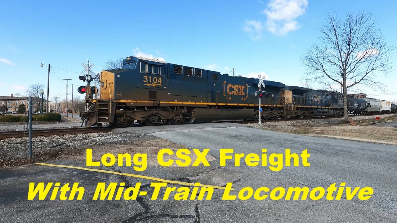 Long CSX Freight with Distributed Power - 3104, 520, 3381