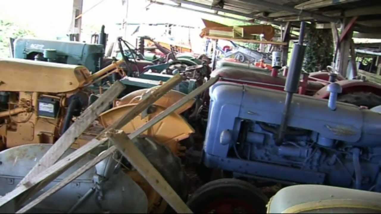 OLD TRACTORS (PART 1) OLD TRACTORS, FARM MACHINERY, IN OLD PRIVATE BARNS.