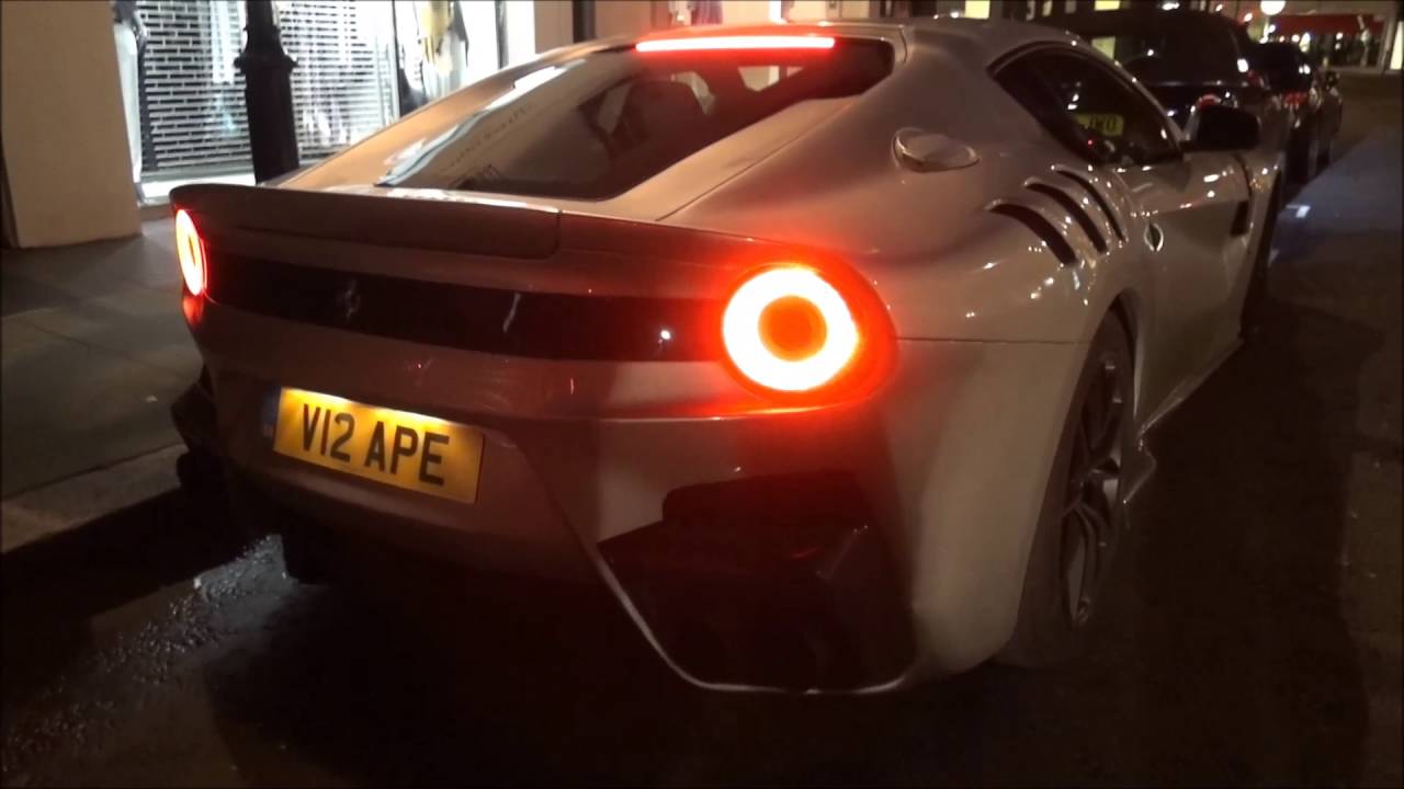 Hugh Grant driving his Ferrari F12 TDF in London!