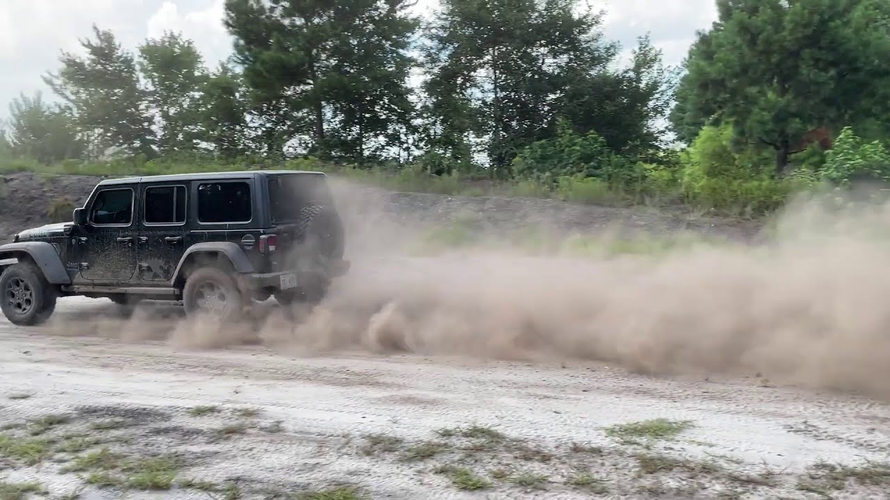 Jeep Wrangler 4XE Willys off road torture test. Tows broken TJ off trail. Mud Bogging. Stupid fast!