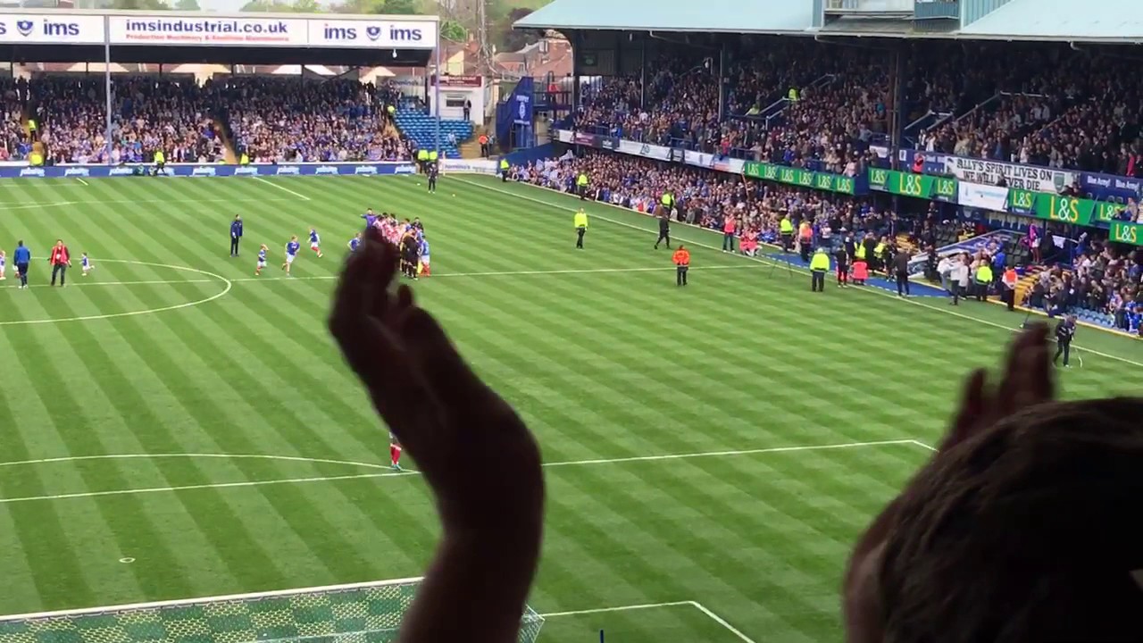 Pompey Fans v Cheltenham Town - Teams Enter The Pitch