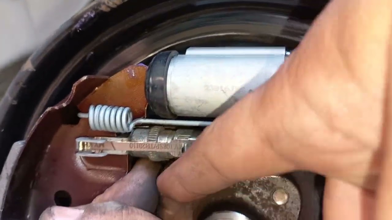 NISSAN ALMERA HOW TO ADJUST HANDBRAKE