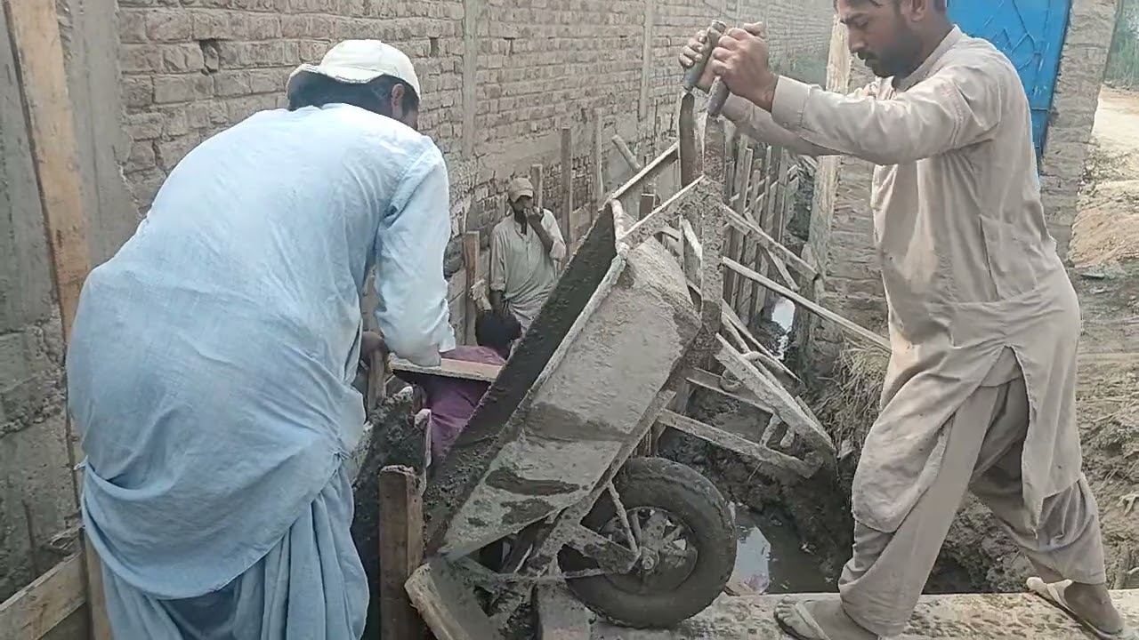 Concrete poring with labour hand mixing for drainage RCC Nallah
