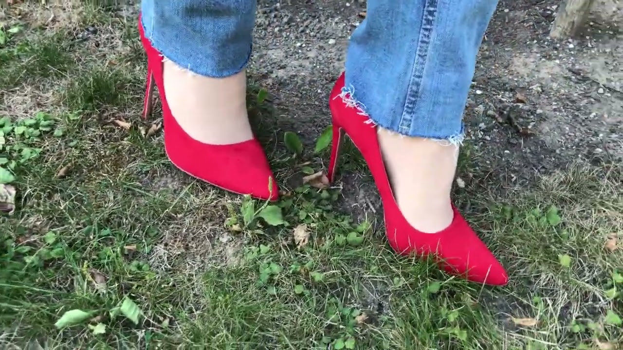 From the gravel to the grass, carefully with my new red high heels