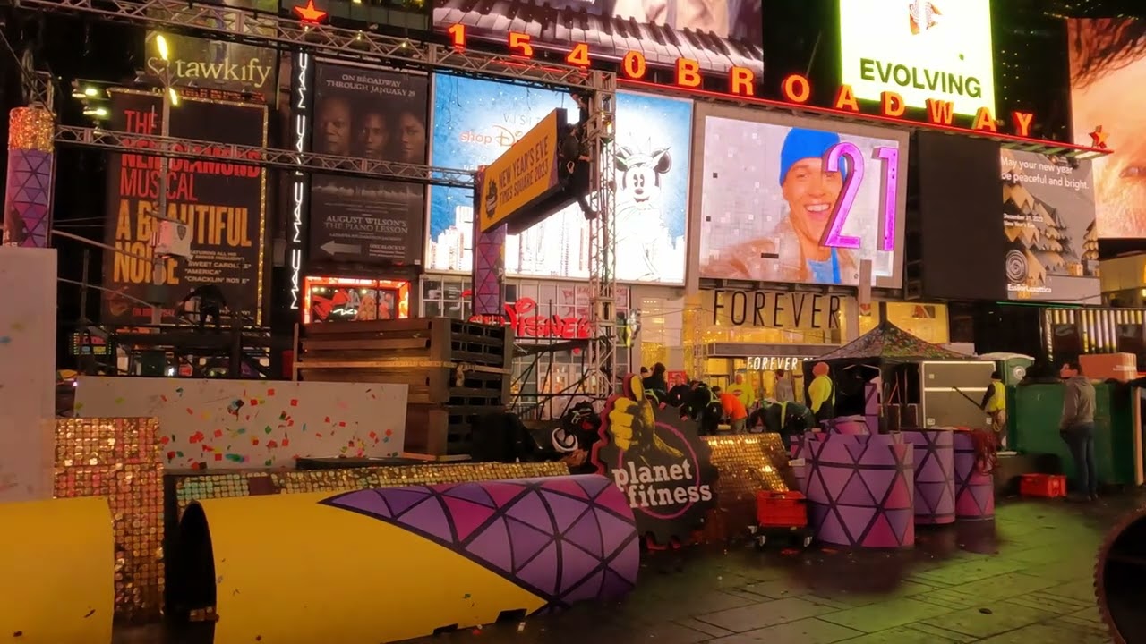 Walking through Times Square, NYC in the aftermath of the New Year's ball drop. Happy 2023!  🇺🇸🥂🍾